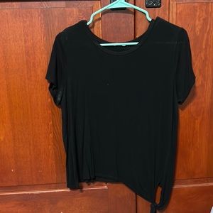 Black shirt with tie at bottom